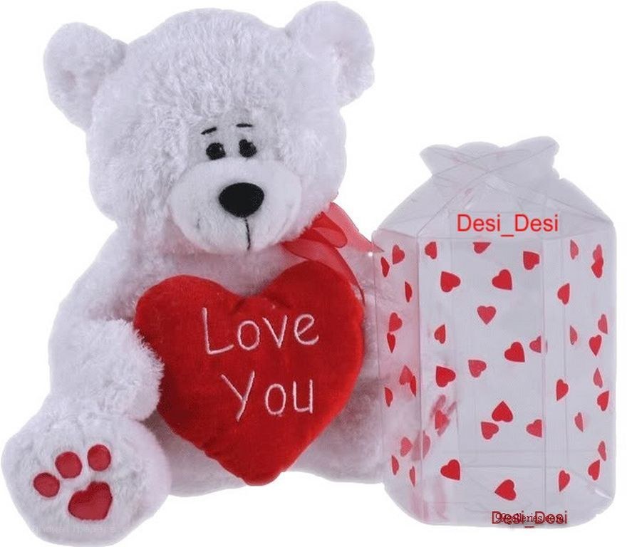 White teddy bear with heart