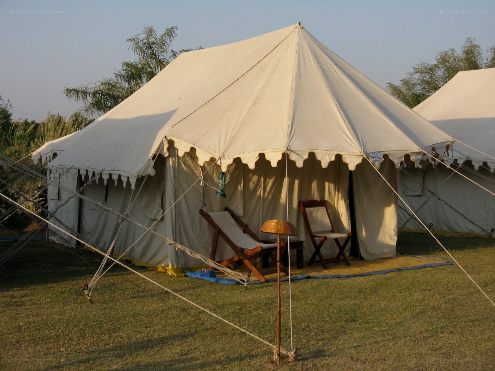 White tent at a campsite
