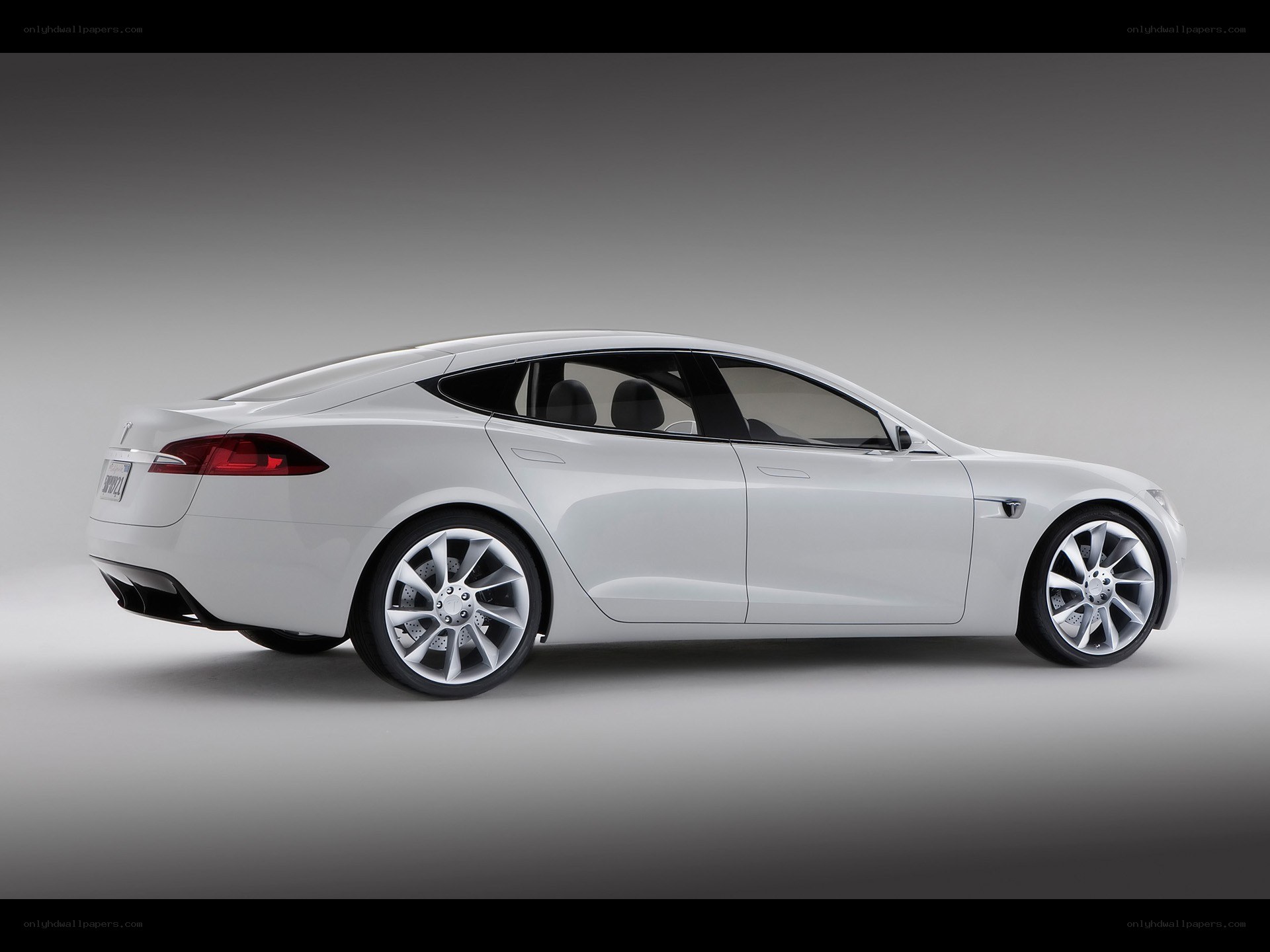 white tesla model s sedan