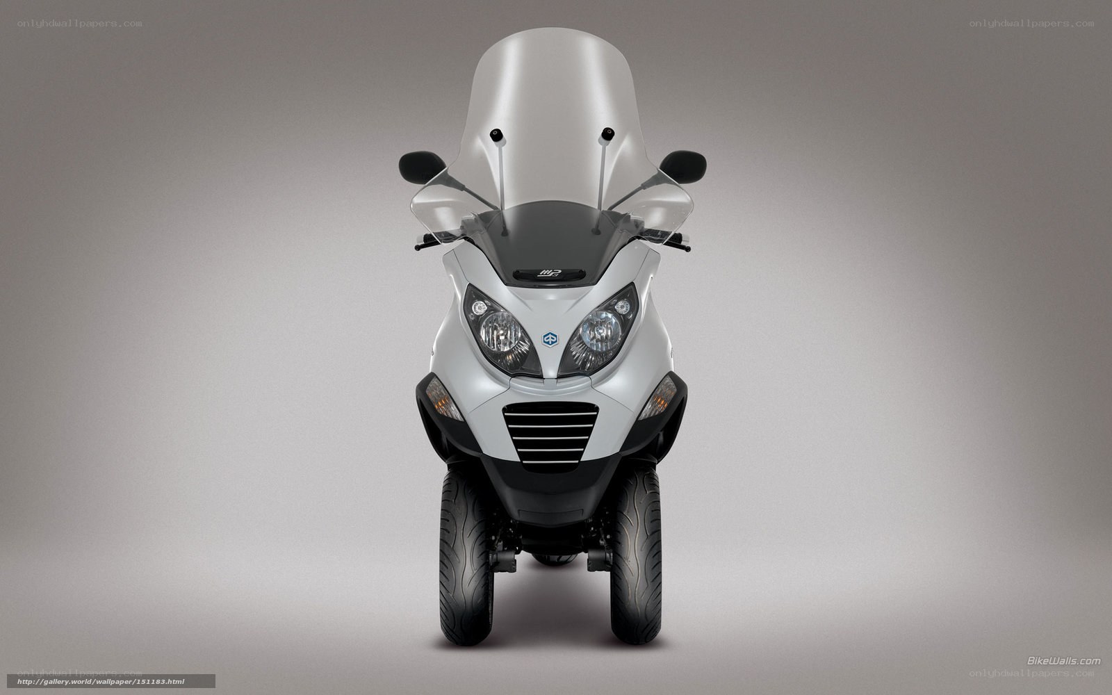 white three-wheeled scooter