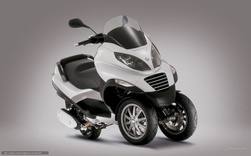 white three-wheeled scooter