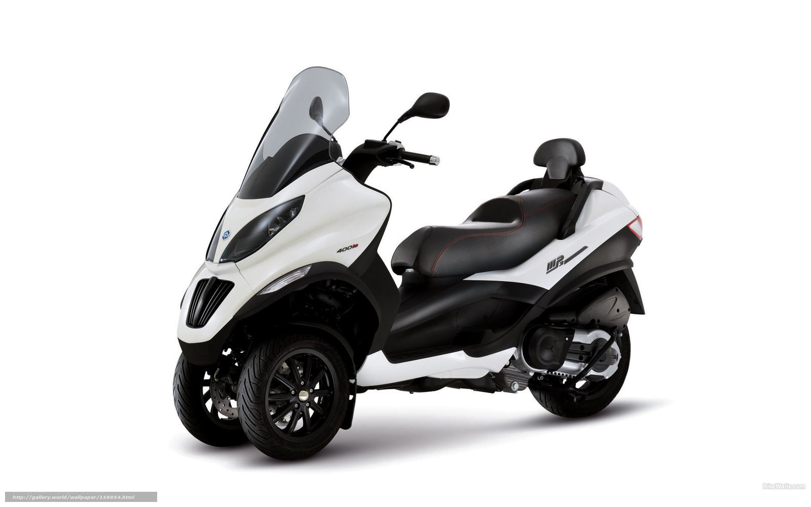 white three-wheeled scooter