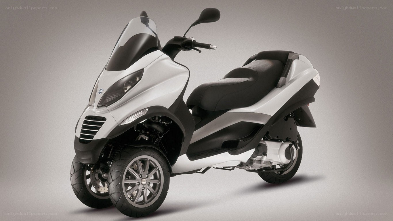 white three-wheeled scooter