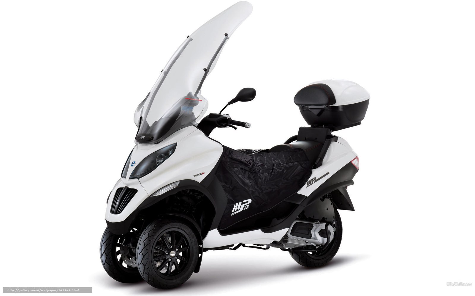 White three-wheeled scooter