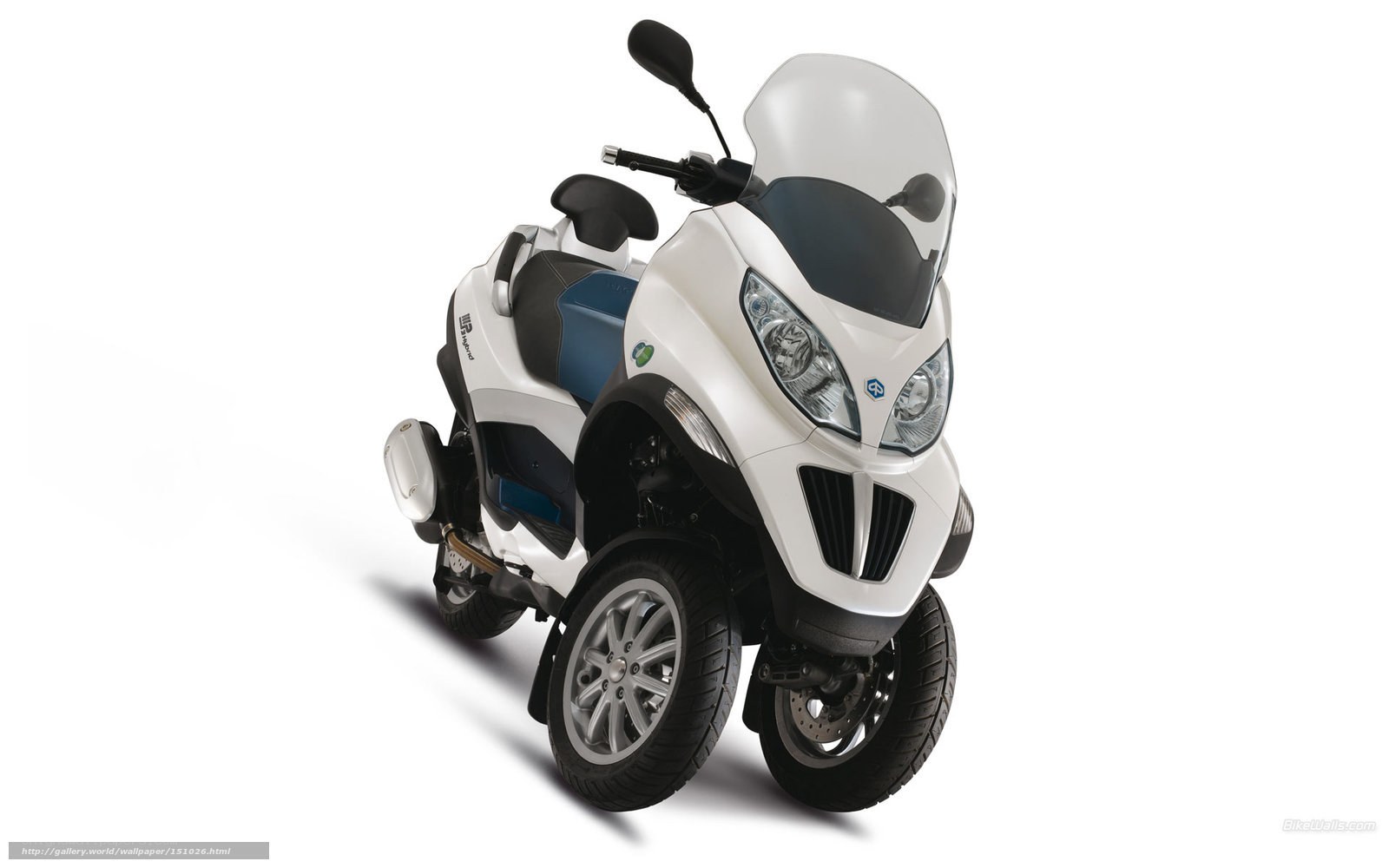 white three-wheeled scooter