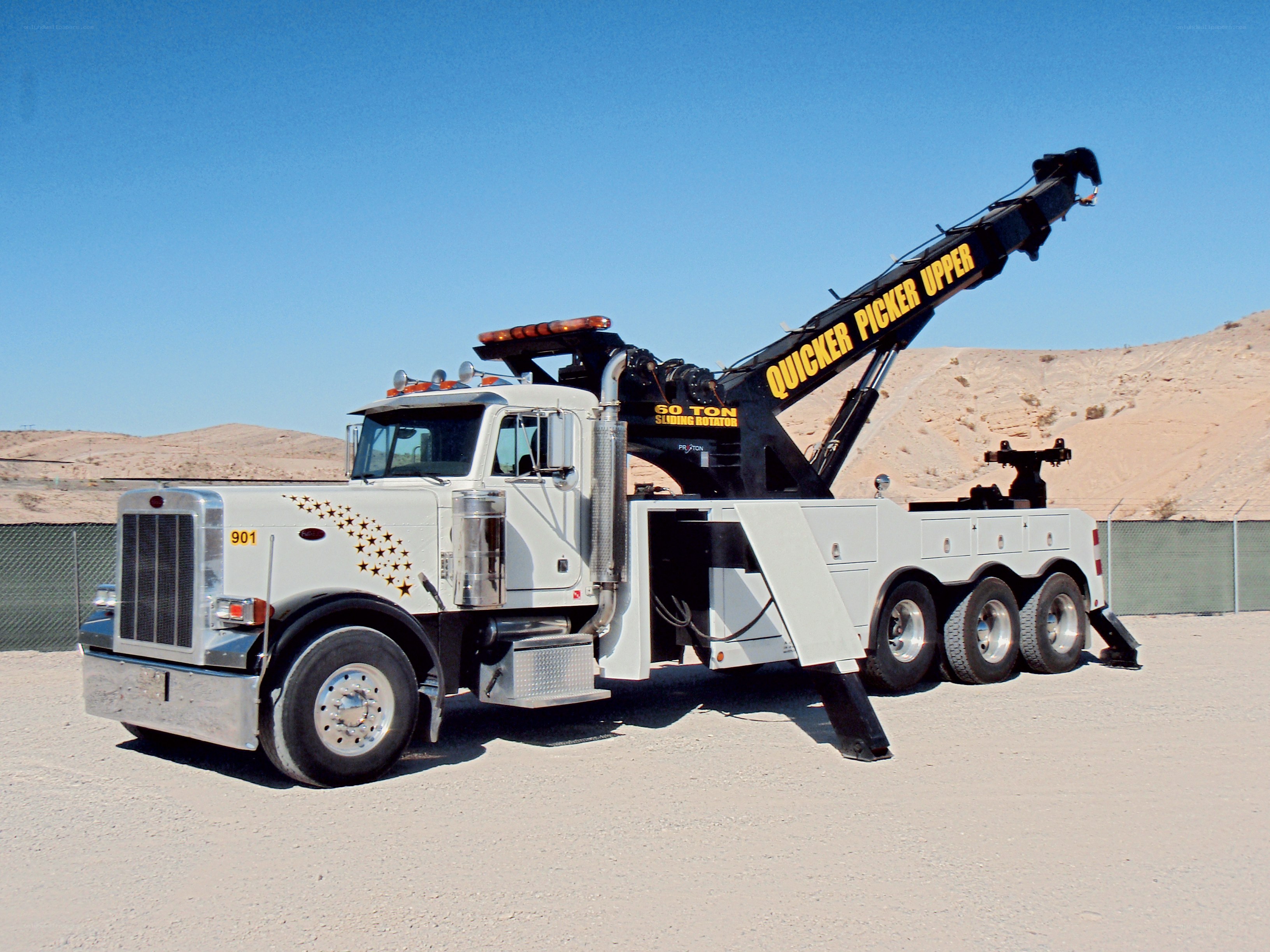 White tow truck with crane