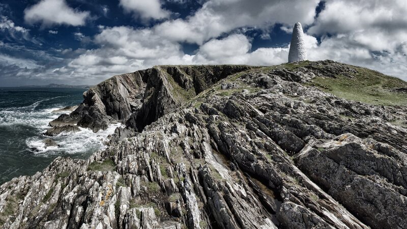 White Tower on Rocky Cliff