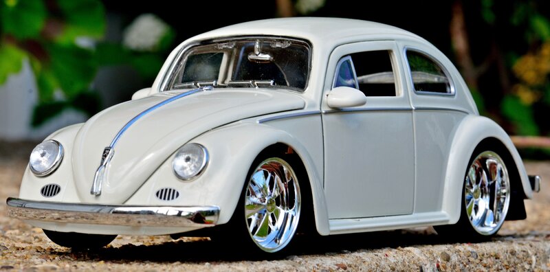 White Toy Beetle Car — Calm
