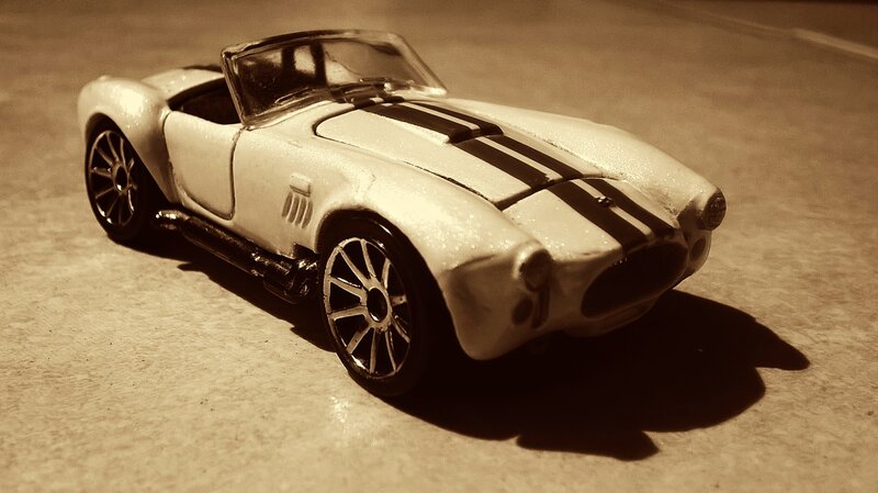 White Toy Car — Sepia
