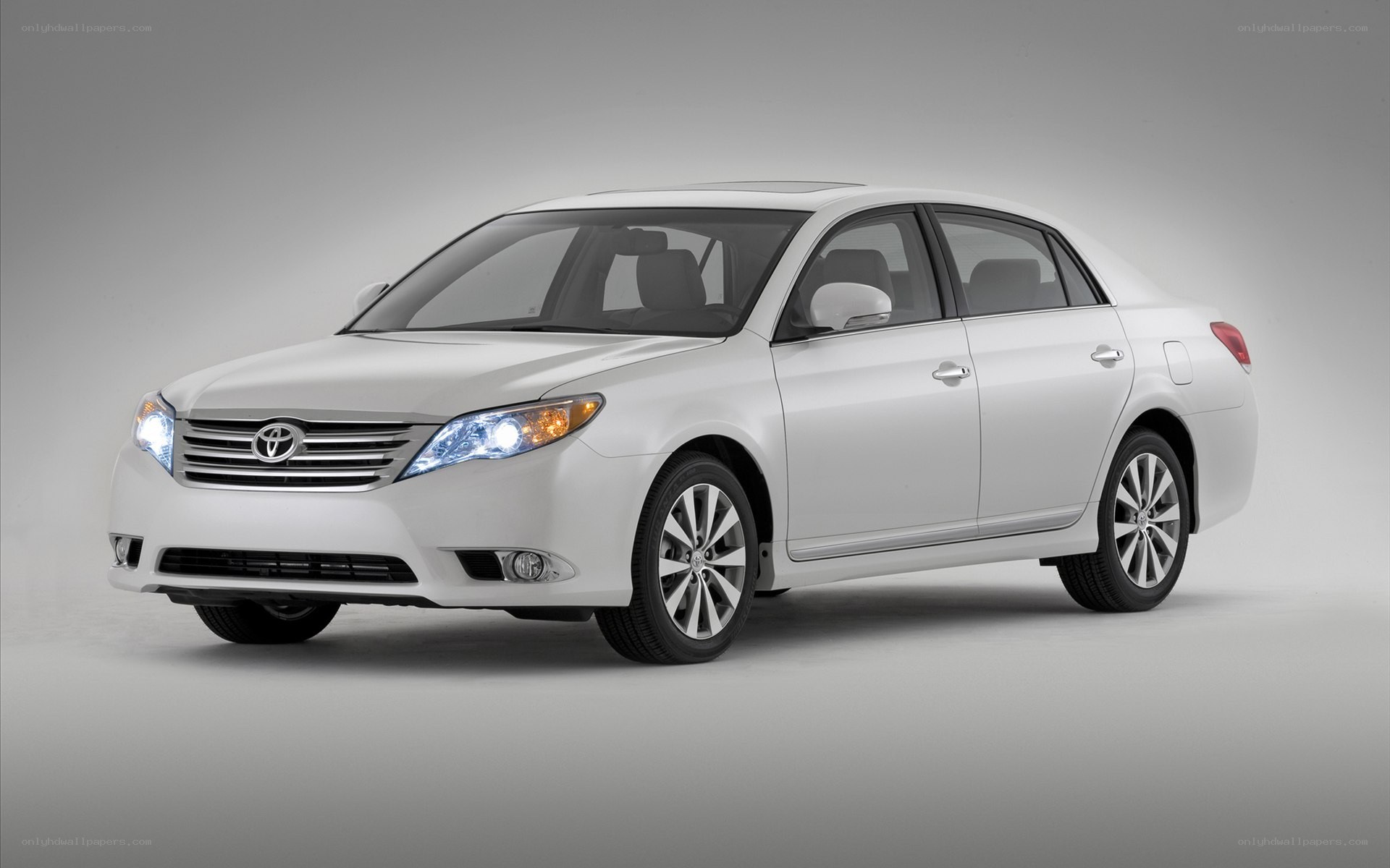 white toyota avalon sedan