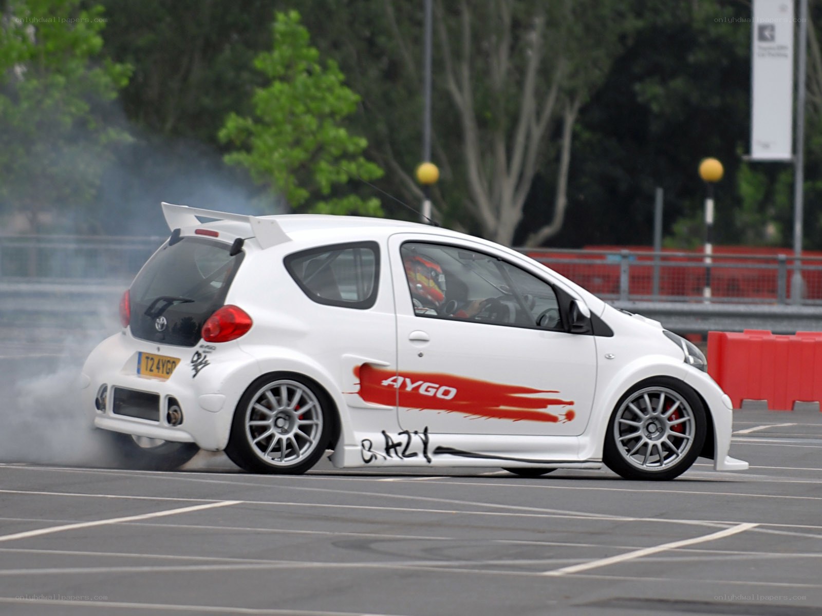 White Toyota Aygo drifting