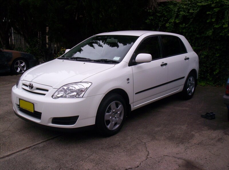 white toyota corolla hatchback