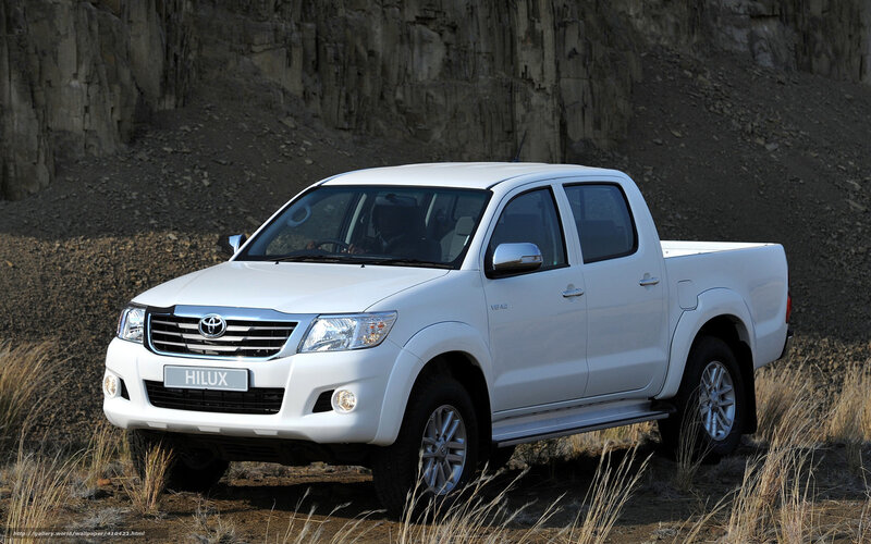 White Toyota Hilux Pickup — Dramatic