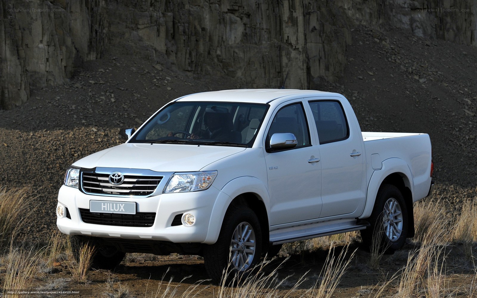 White Toyota Hilux pickup truck