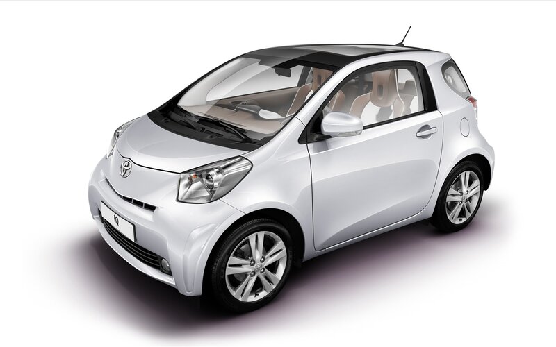 White Toyota iQ compact car