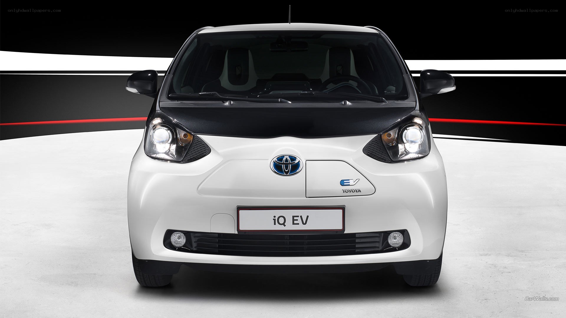 White Toyota iQ EV car