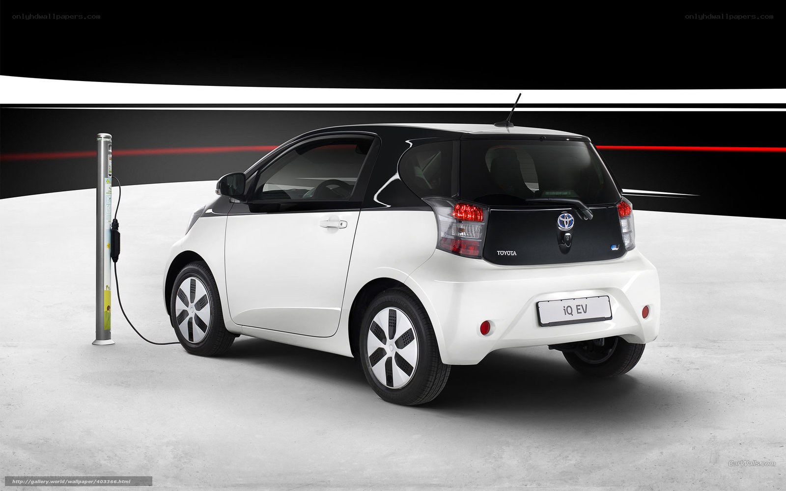 White Toyota iQ EV charging