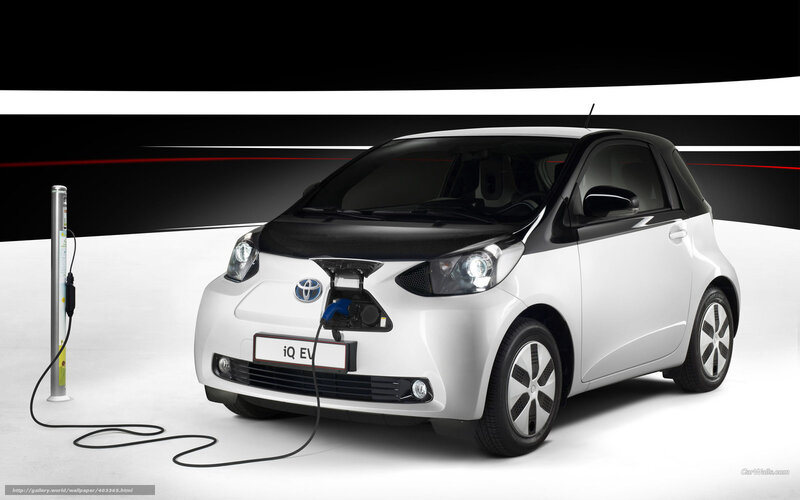 White Toyota iQ EV charging