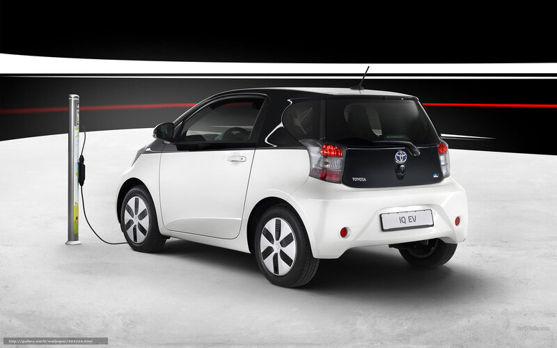 White Toyota Iq Ev — Dramatic, Photograph, Charging Station