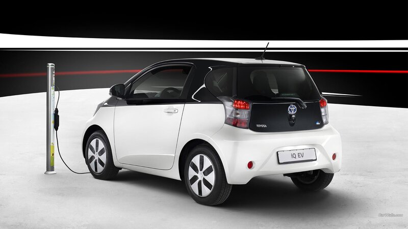 White Toyota Iq Ev — Dramatic, Photograph