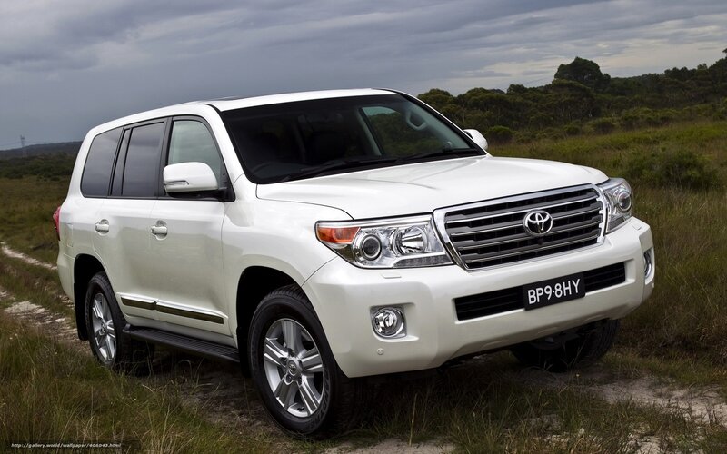 White Toyota Land Cruiser — Dramatic