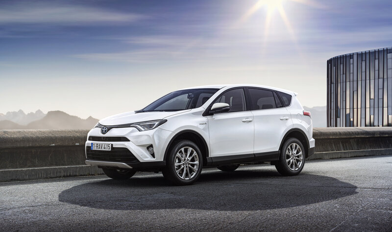 White Toyota RAV4 on a scenic road