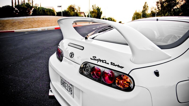 White Toyota Supra — Dramatic