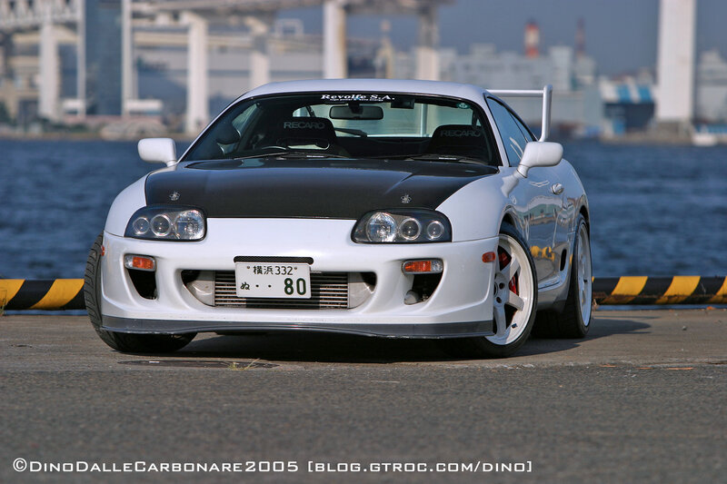 White Toyota Supra on a pier