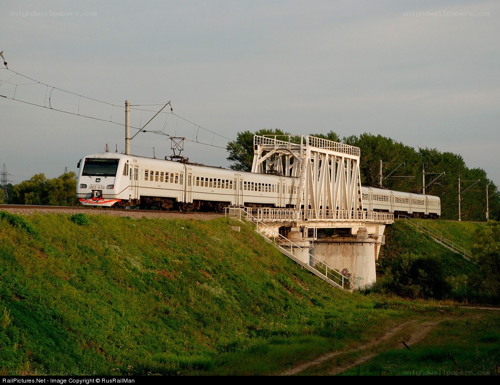 White train on a bridge