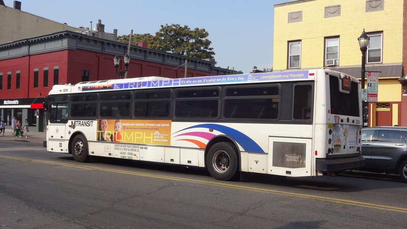 White Transit Bus — Urban