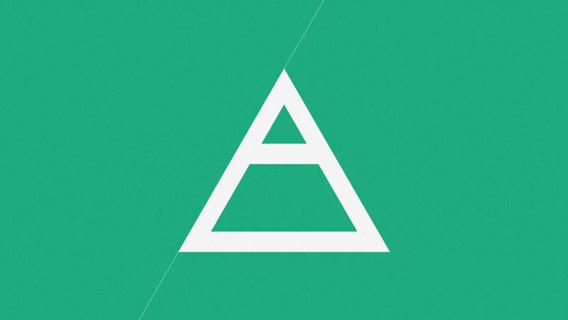 white triangle on green background