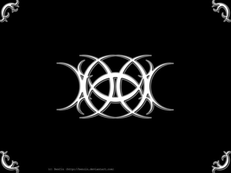 white tribal symbol on black