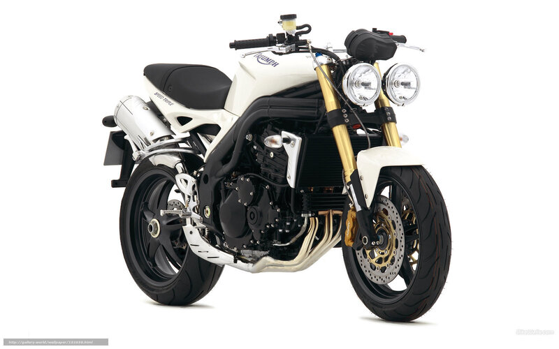 white triumph speed triple motorcycle