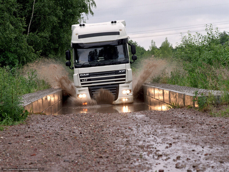 White truck driving through water