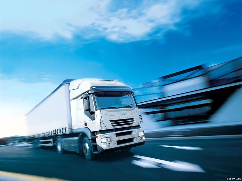 White truck in motion on highway
