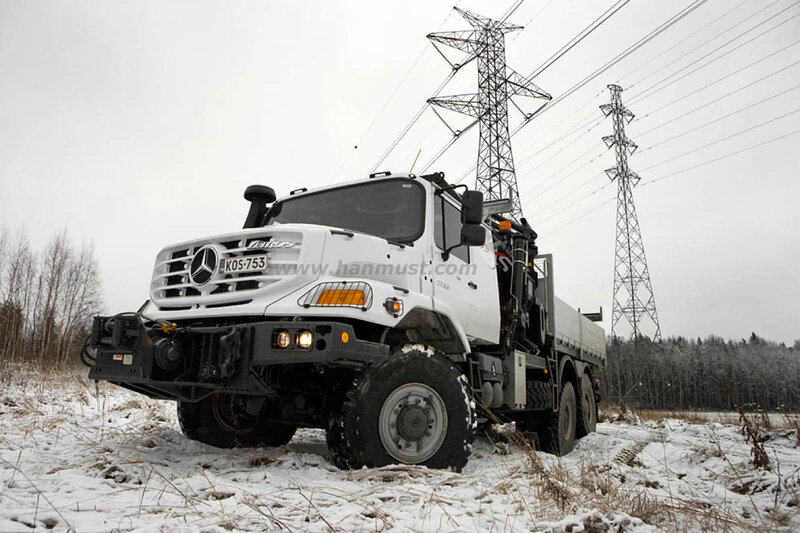 White truck in snowy field