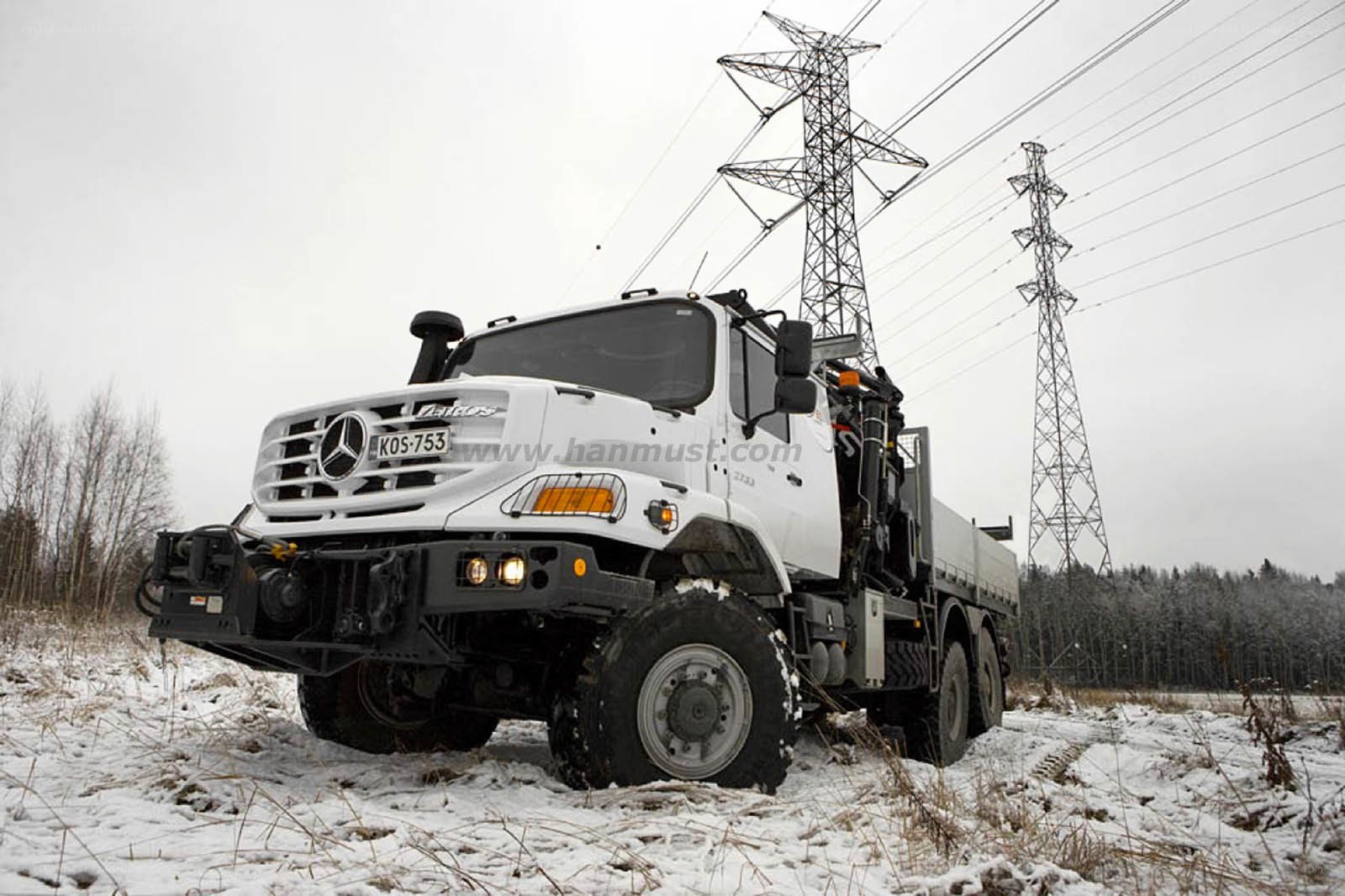 White truck in snowy field