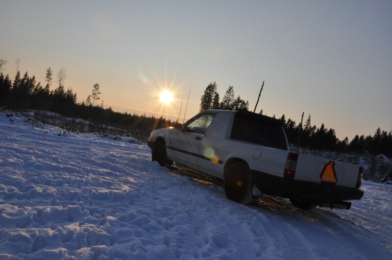 White truck in snowy landscape