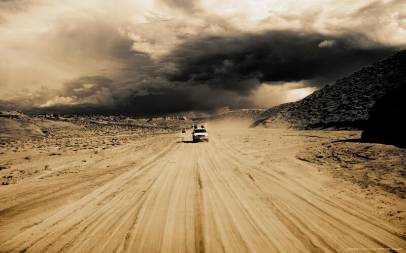White Truck on Dirt Road — Brown, Dramatic