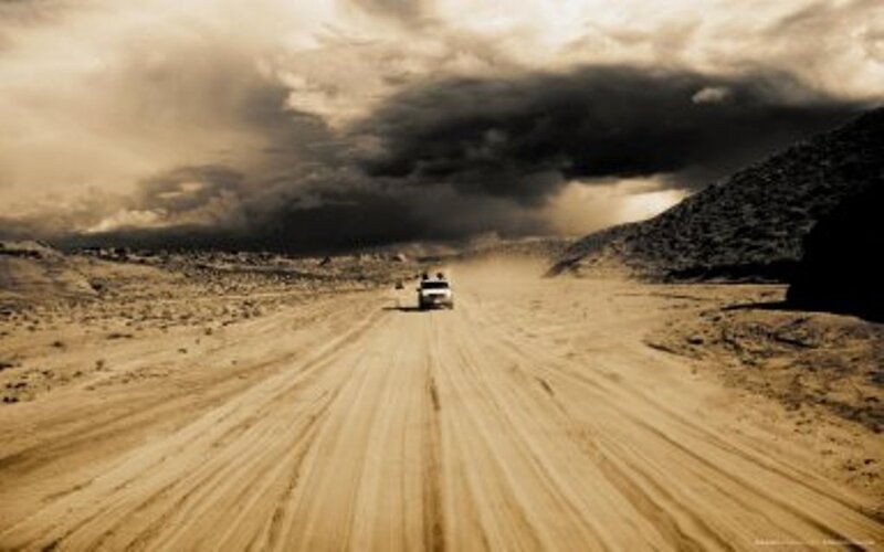 White Truck on Dirt Road — Brown