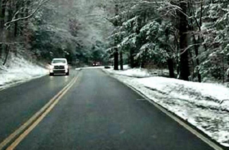 White Truck on Snowy Road