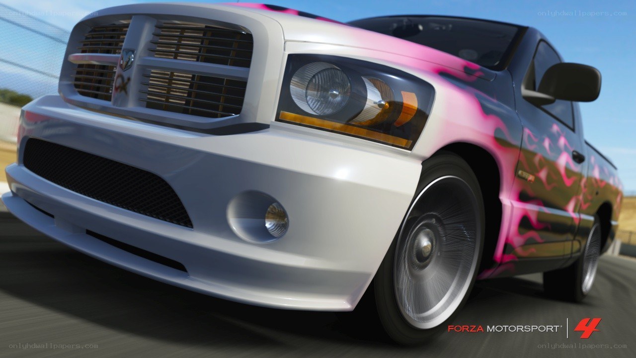 white truck with pink flames
