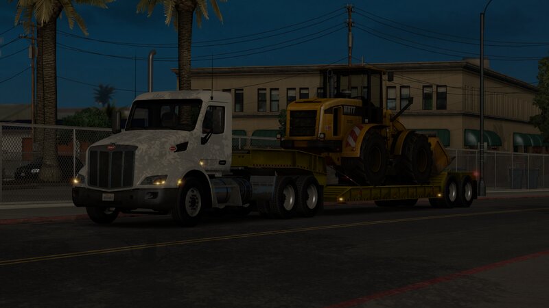 White Truck with Yellow Tractor