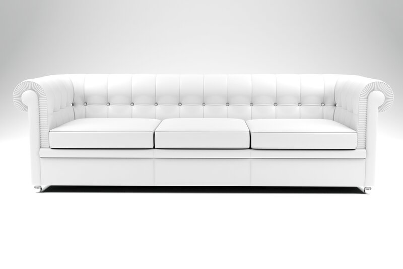 white tufted leather sofa