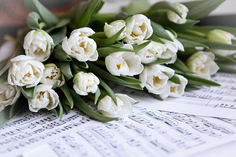 White Tulips on Sheet Music