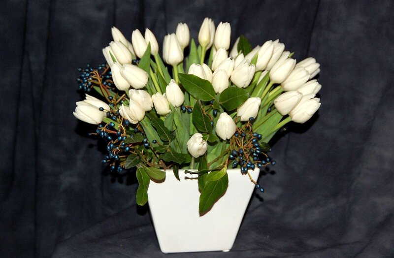 White tulips with berries