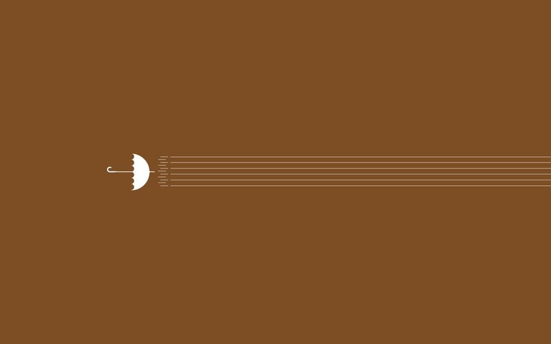 white umbrella on brown background