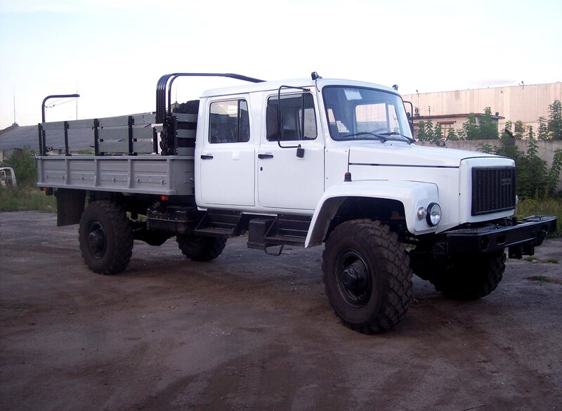 white utility truck with flatbed