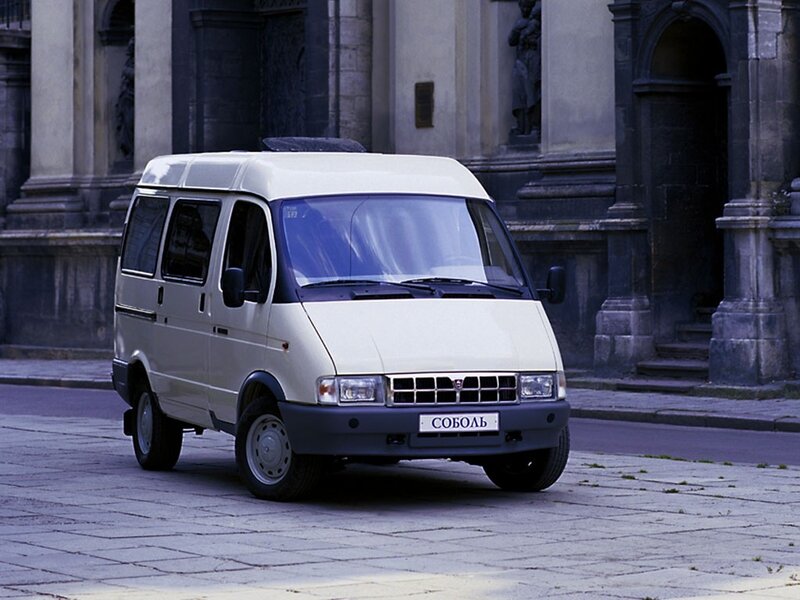 White van in front of a building