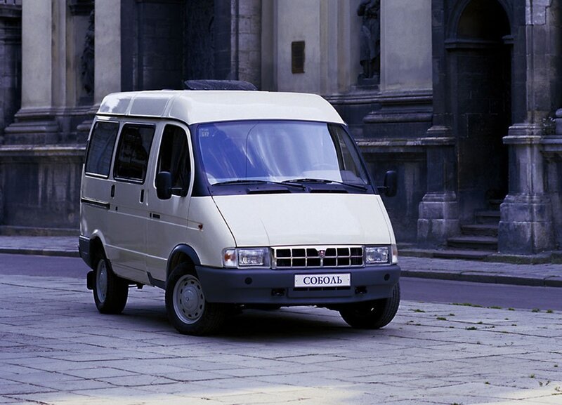 White van in front of a building